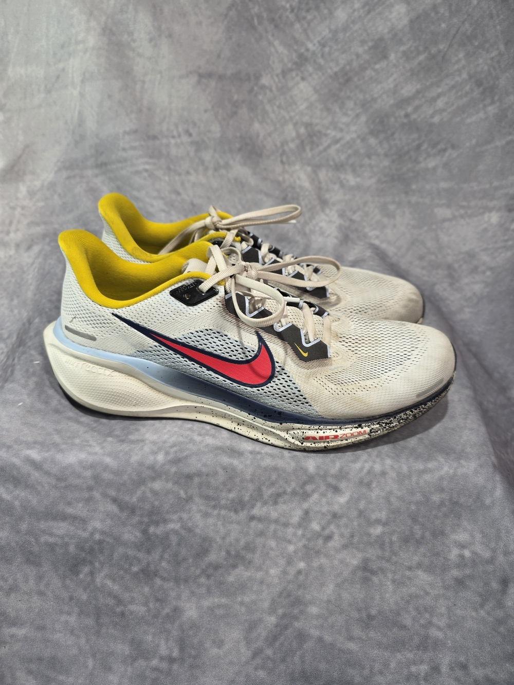 Nike Air Zoom Pegasus 41 in the White/Psychic Blue/Speed Yellow/Speed Red color